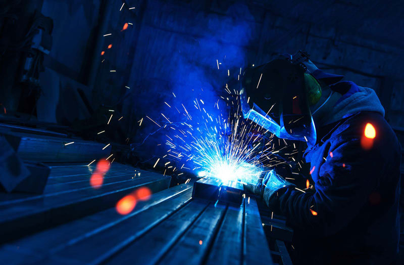 Someone welding metal